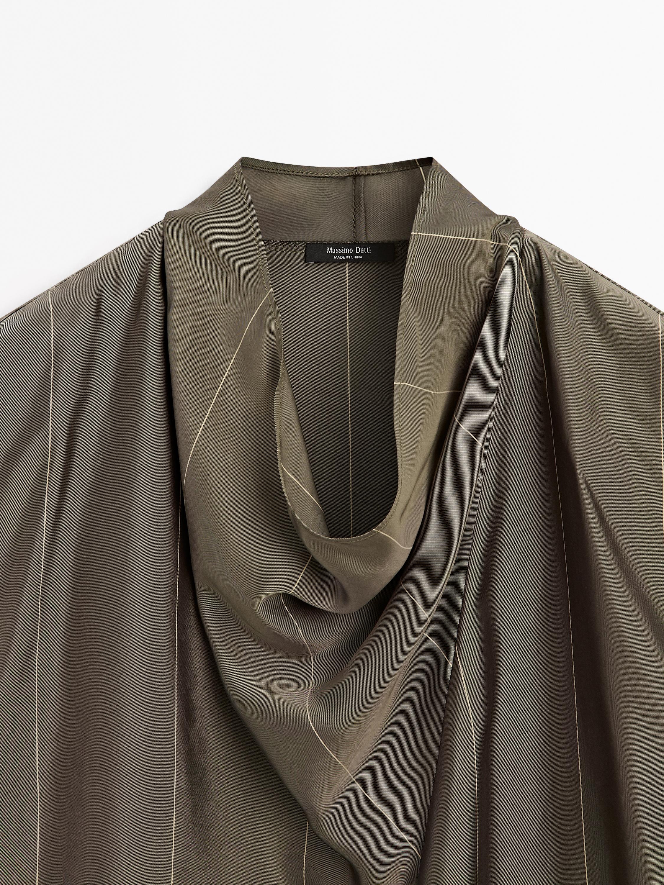 Flowing blouse with striped details